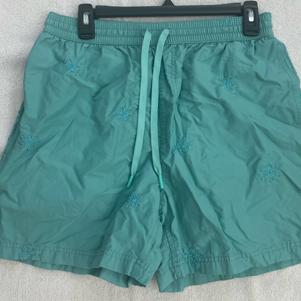 Urban outfitters swim trunk material shirts with flower embroidery.